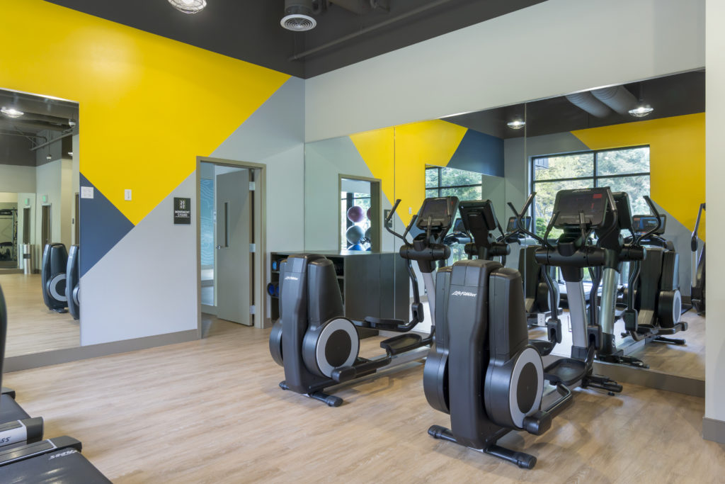 fitness center with cardio equipment