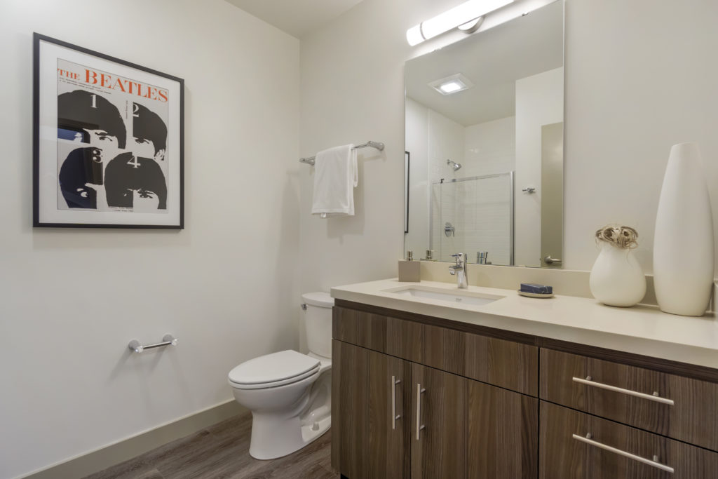 Bathroom with toilet and stall shower