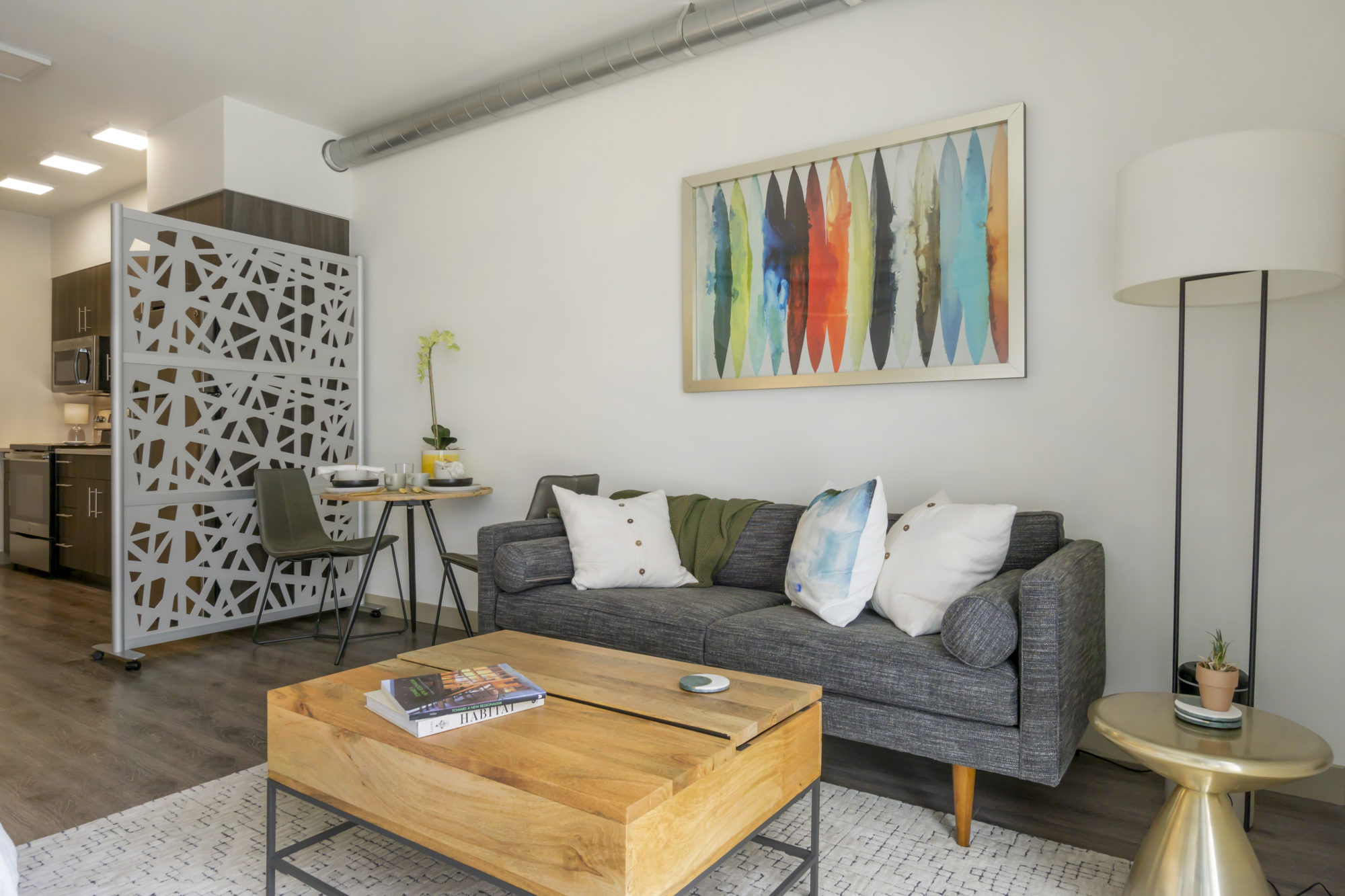 Open concept living room with view into kitchen