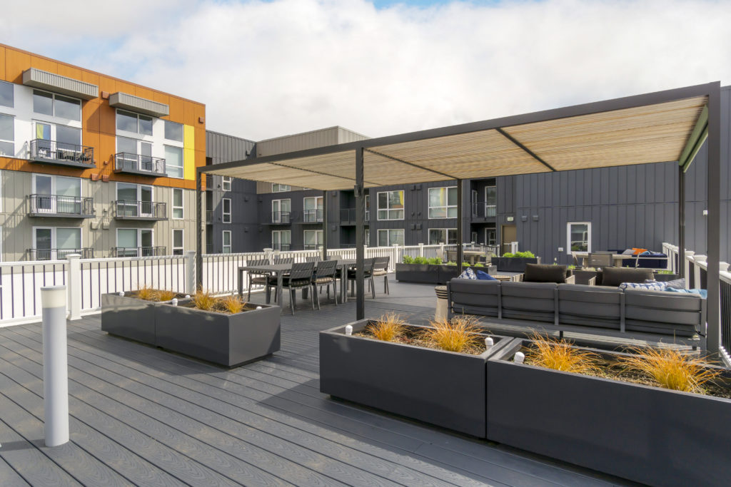 outdoor rooftop with sofas and chairs